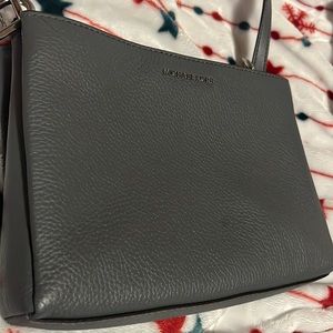 Michael Kors gray mini handbag/purse.
